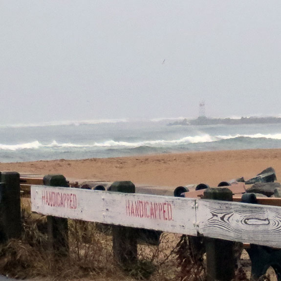 The sea was rough with mist in the wind, and few birds flying.  This is the breakwater at Salisbury Beach where Purple Sandpipers hang out at high tide.  Not today.