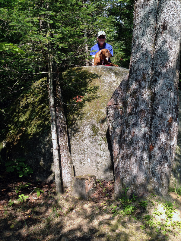 This boulder was at the side of our campsite.  Penny is putting up with me but ready to get down.