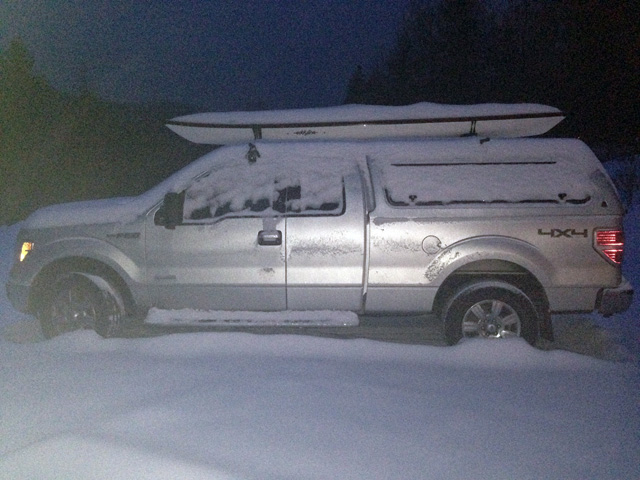 The truck was coated and the kayak was wondering what it was doing on the rack.