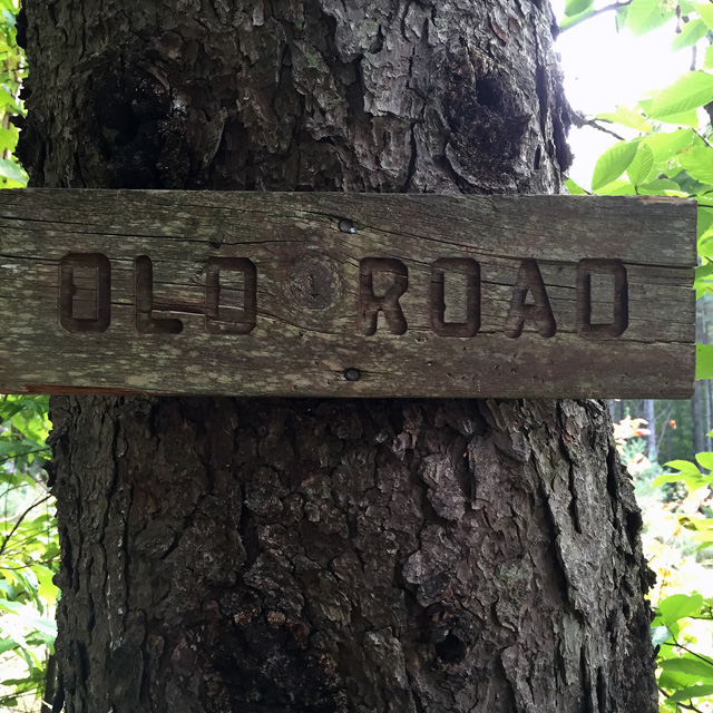 The sign marking the end of our jaunt -- made many years ago by the first owner of the property.